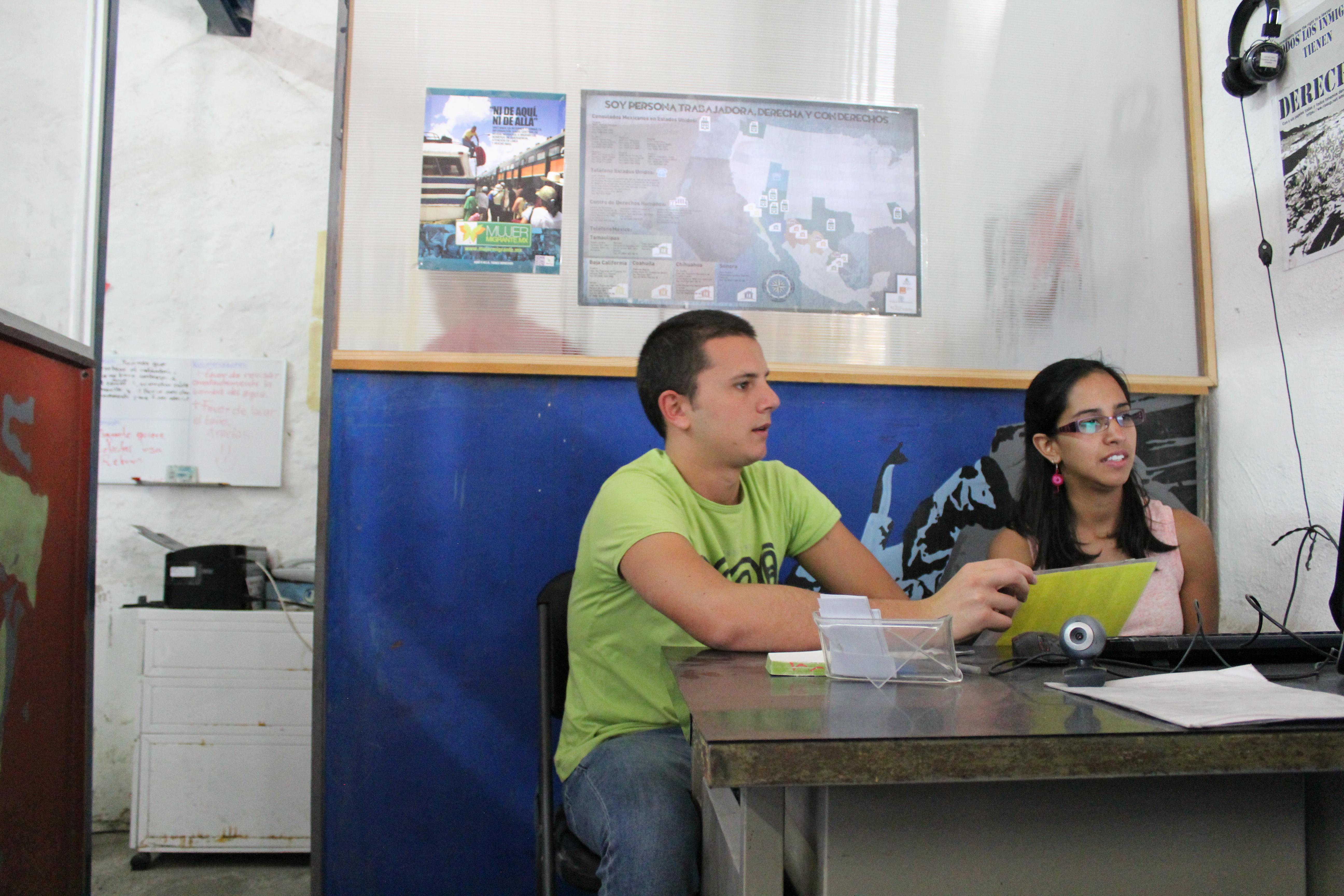 Projects Abroad International Development interns sit at a desk in an office develpoing campaign work during their International Development work experience in Mexico. International Development interns work at a computer to create funding campaigns during their Internship in Mexico.